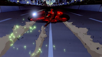 Akira screenshot of Kaneda and his red motorcycle in Neo Tokyo