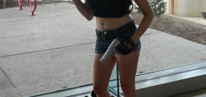 Revy Two Hands from Black Lagoon cosplay dual wielding pistols as the ultimate tomboy in anime
