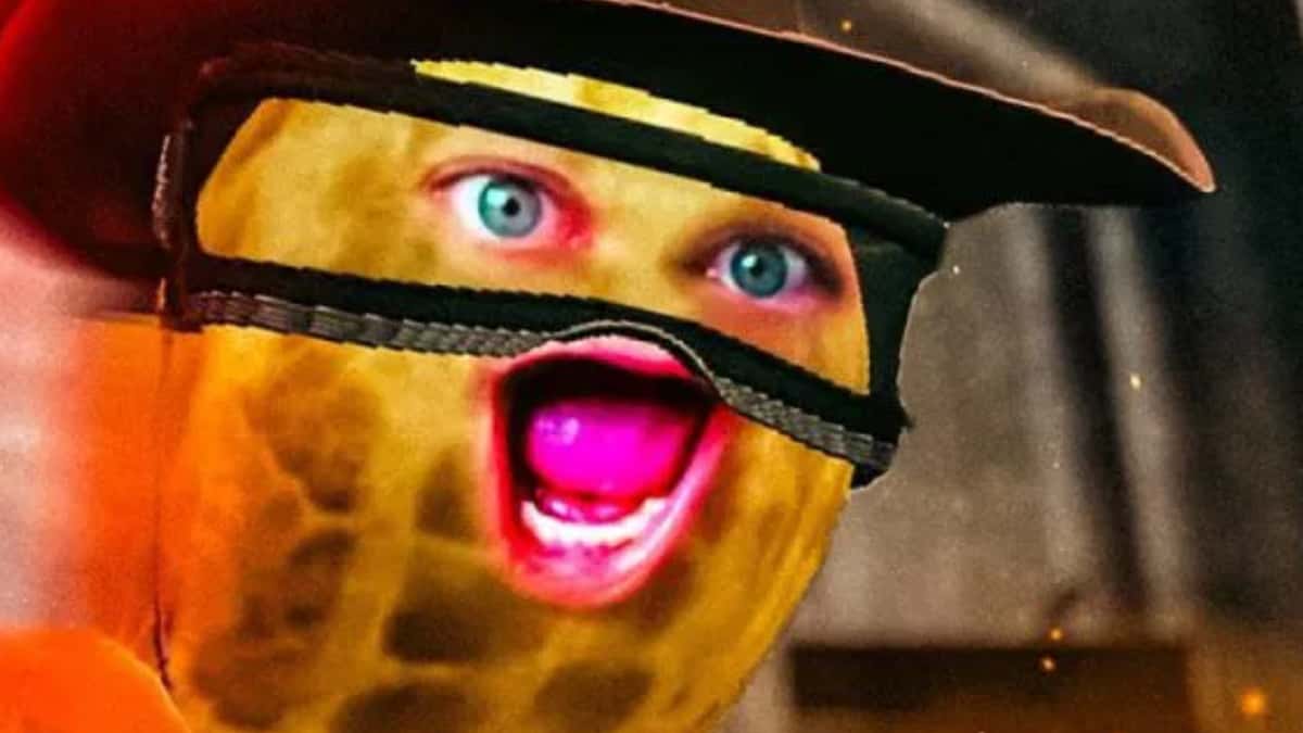 The peanut VTuber live on Twitch with the bouncing peanut avatar reacting during an FPS gameplay stream.
