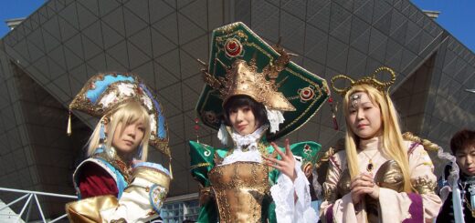 A crowd of anime cosplayers in detailed costumes on a convention floor showing what cosplay is.