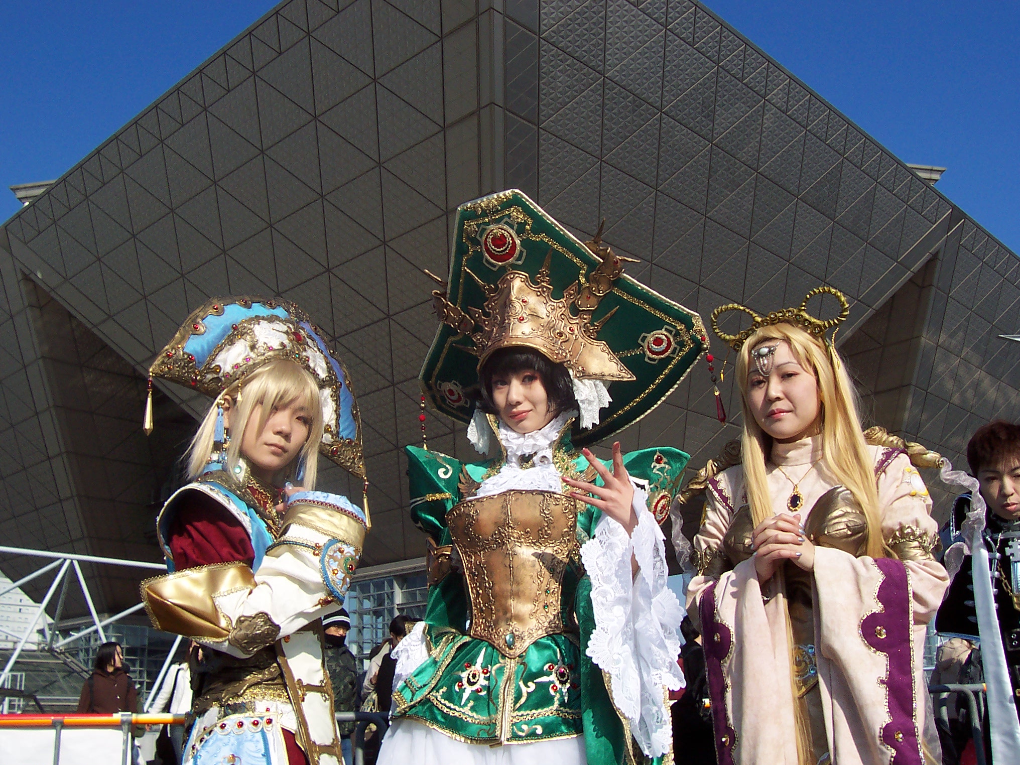 A crowd of anime cosplayers in detailed costumes on a convention floor showing what cosplay is.