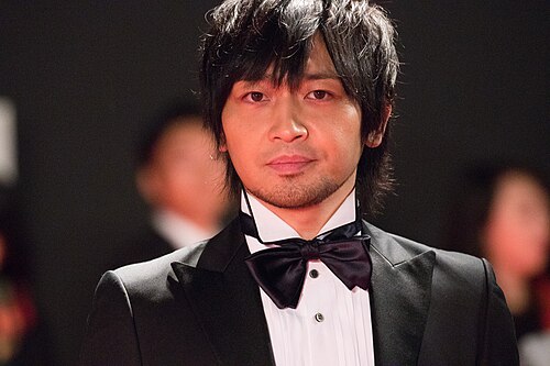 Yuichi Nakamura the Japanese voice actor of Satoru Gojo on a red carpet