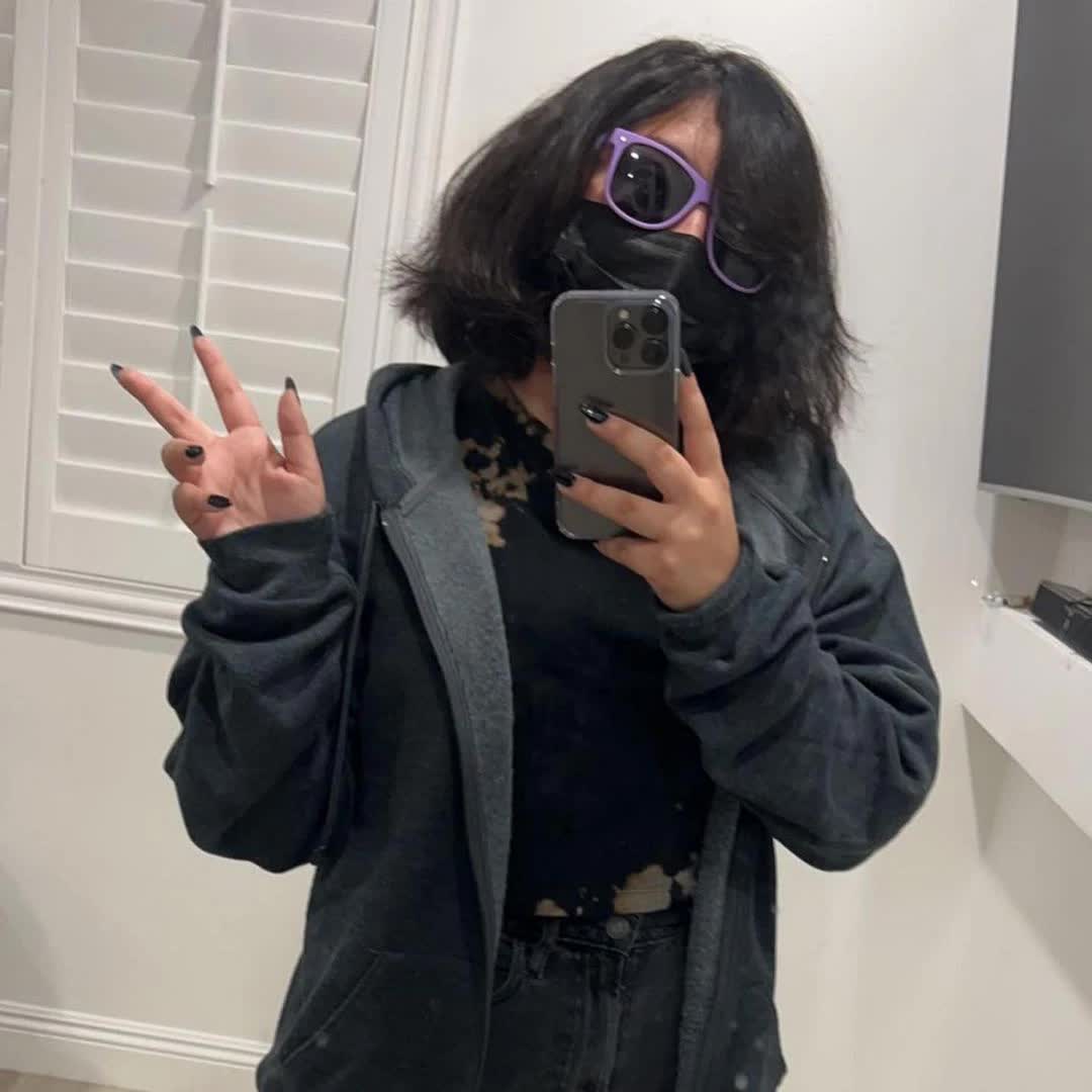 Jelly Bean masked mirror selfie shared publicly by BeanNotHere
