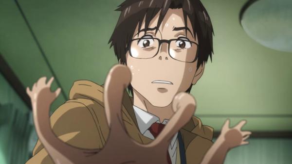 Shinichi Izumi reacts as Migi the parasite forms from his right hand in Parasyte the Maxim anime